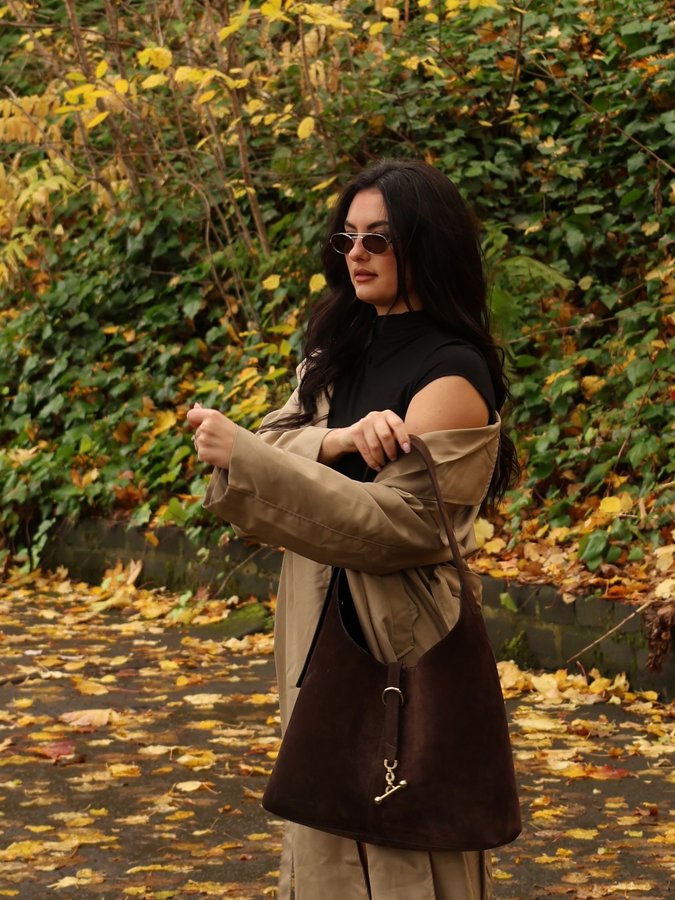 Instagram post by @mary.cj.skinner for Strathberry. Caption reads: loves a mary poppins bag 👜👜 with strathberry’s....