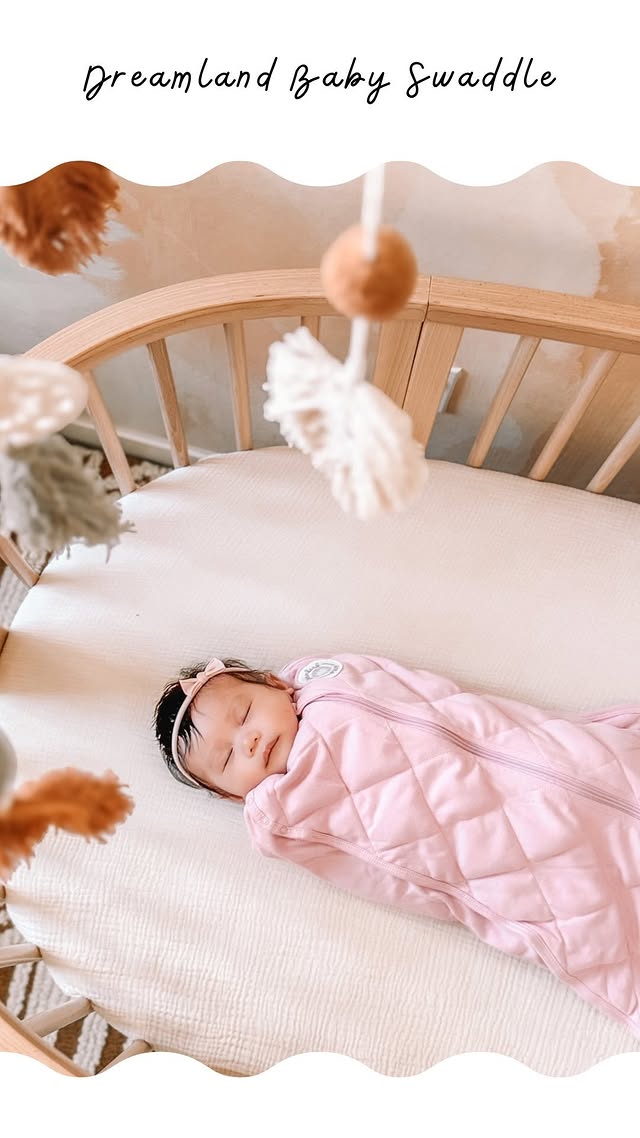 Instagram post by @_jacqueline.nicole for Dreamland Baby. Caption reads: I love how peaceful she looks! The....