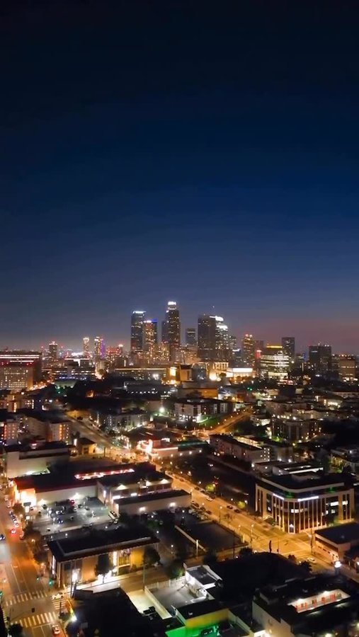 Instagram post by @adriianguuzman for Discover Los Angeles. Caption reads: 🎥: @adriianguuzman Good night LA 💕 #discoverLA....