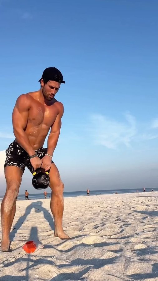 Instagram post by @brian_pruett for Nike Swim. Caption reads: Beach workout loading…💪🏼

This combo hits....