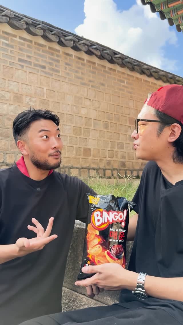 Instagram post by @jinjung.brothers for Bingo! Snacks. Caption reads: Korean: “Fighting” = You got this 💪
Hindi:....