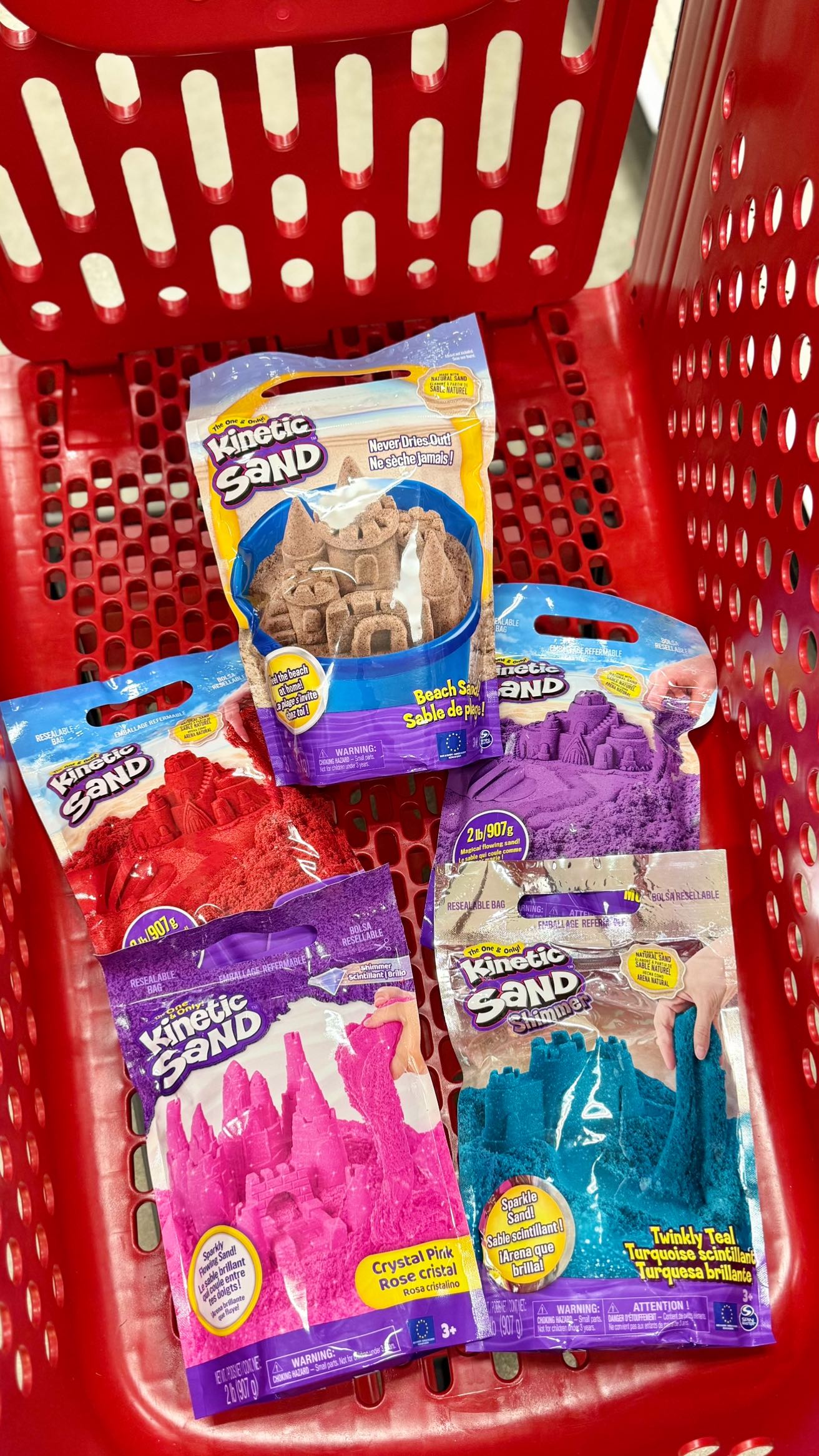 Instagram post by @targetovereverything for Kinetic Sand. Caption reads: [...] you’re little one is sure to love!....