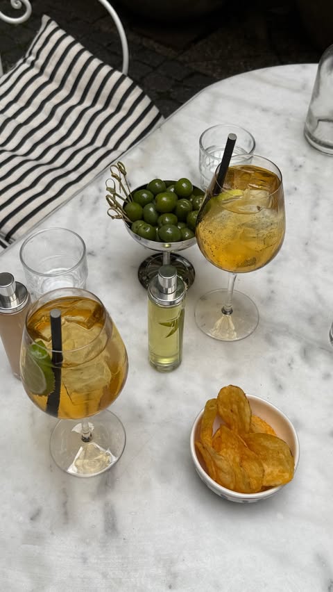 Instagram post by @michellefleur for Mugler. Caption reads: [...] moments with my girls, mocktails &....
