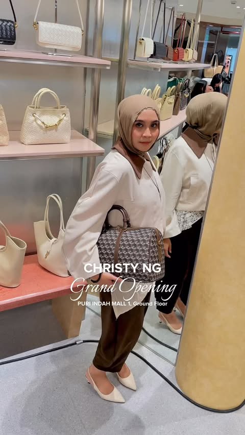 Instagram post by @lizaantikad for Christy Ng. Caption reads: Store baru @christyng.id sudah hadir di Puri Indah....