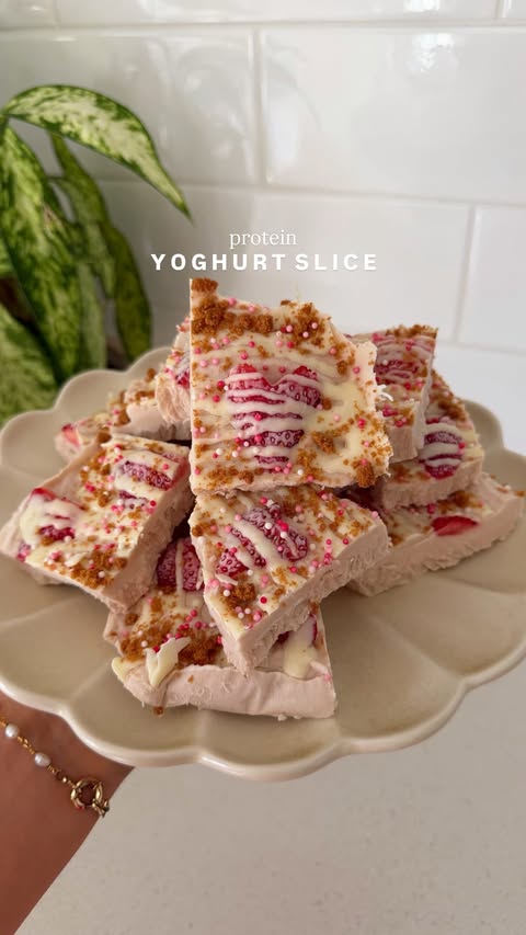 Instagram post by @nutrition.by.kayla for Anytime Fitness. Caption reads: PROTEIN YOGHURT BARK 🍓🫶🏻 Looking for a....