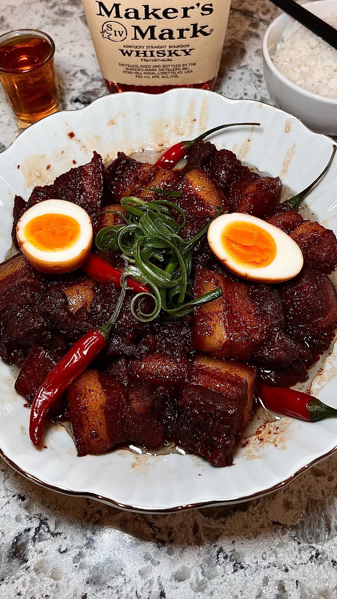 Instagram post by @seattlefoodieadventure for Maker’s Mark. Caption reads: #Ad21+ Thit Kho anyone? Join me and Maker’s Mark....