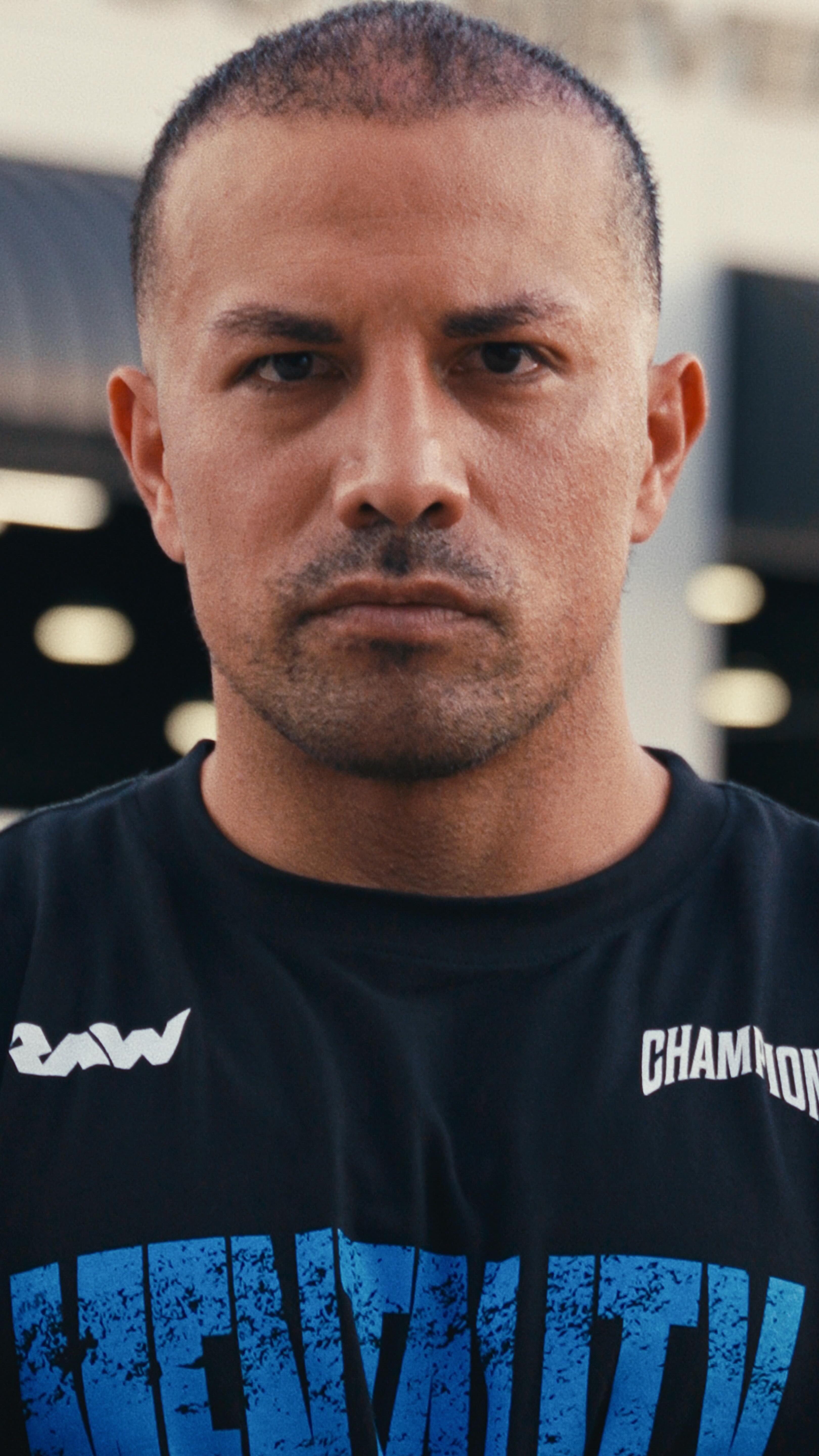 Instagram post by @christianguzmanfitness for – Get Raw Nutrition. Caption reads: The best partnerships are built on shared history....