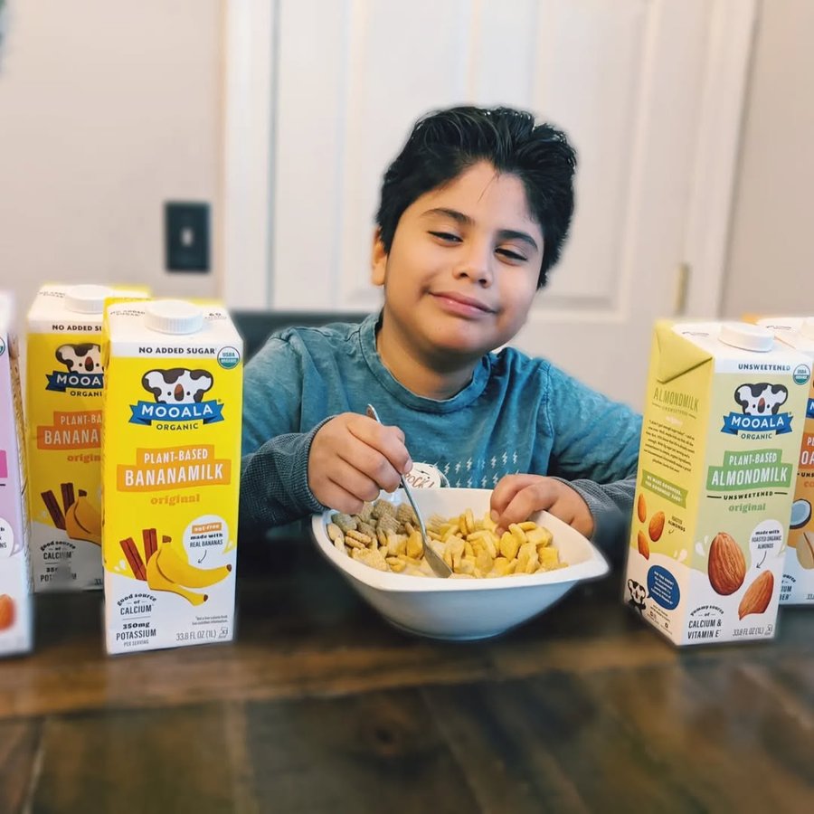 Instagram post by @mama.shirboyz for Mooala. Caption reads: Logan has been loving @mooala_koala plant based....