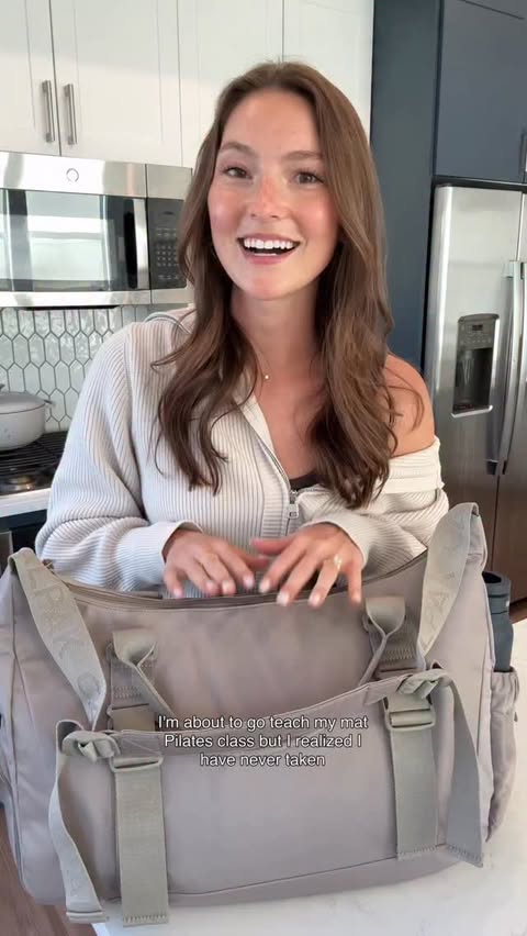 Instagram post by @the.dailyrule for CALPAK. Caption reads: [...] Instructor in my Fit Gym Bag from @calpak....