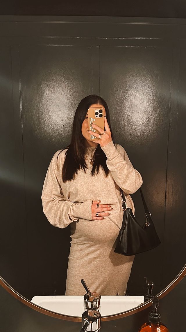 Instagram post by @_lomeyer_ for Marc Fisher. Caption reads: comfy + chic + bump friendly 👏🏼 comment OUTFIT....