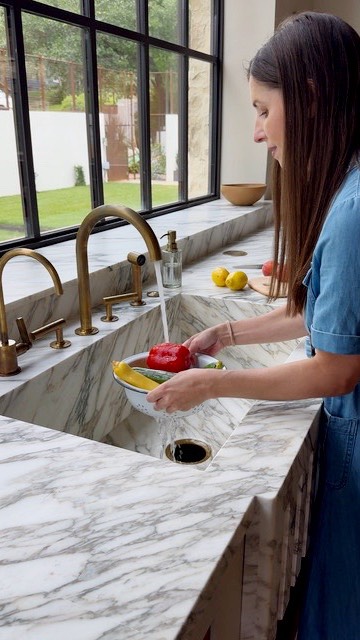 Instagram post by @loveandlemons for Culligan. Caption reads: [...] dream kitchen build? Great tasting....