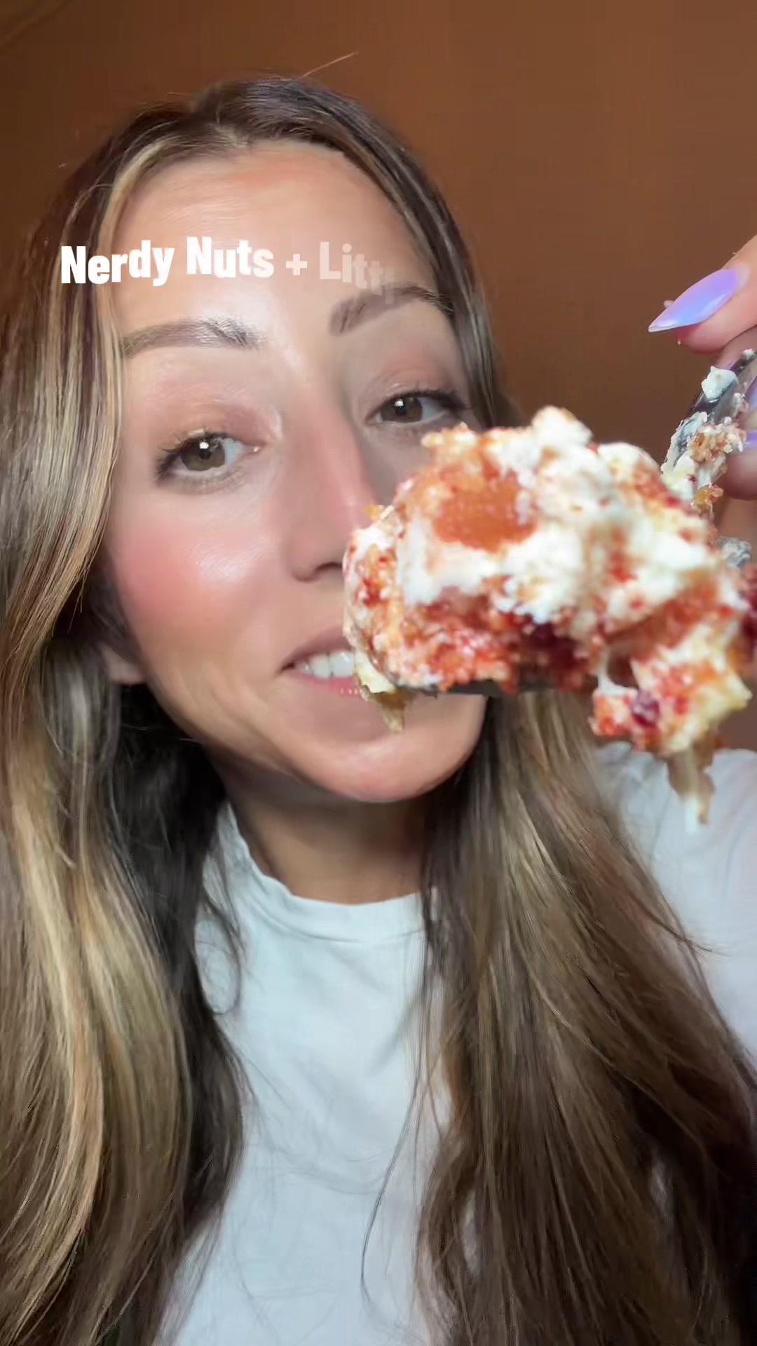 TikTok post by @carrissa_22 for Nerdy Nuts. Caption reads: Let’s eat the @Nerdy Nuts Shop strawberry....