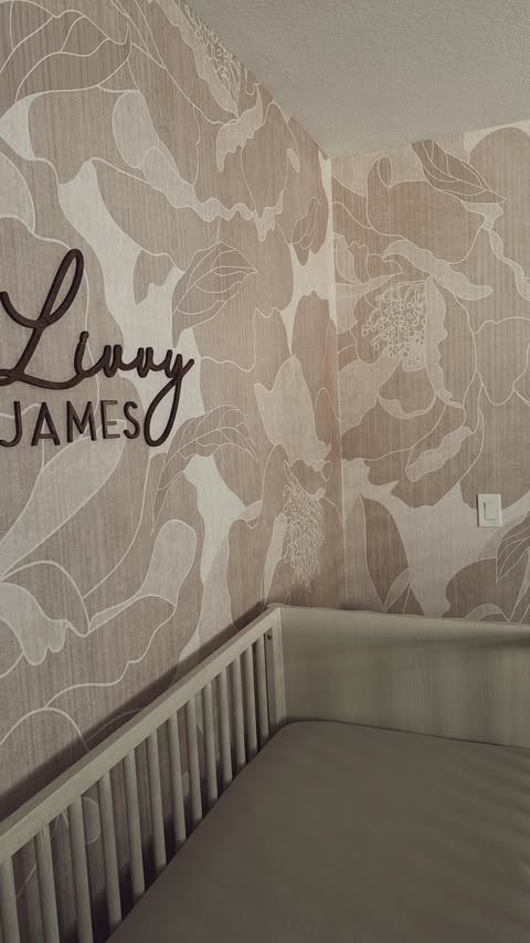 Instagram post by @hayleylarue for Photowall. Caption reads: [...] a room. Livvy’s wallpaper is 25% off....