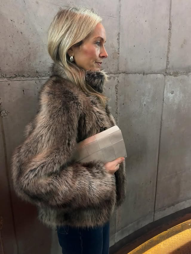 Instagram post by @phodgie for MINT VELVET. Caption reads: The hunt for my winter fur is over - it’s cosy and....