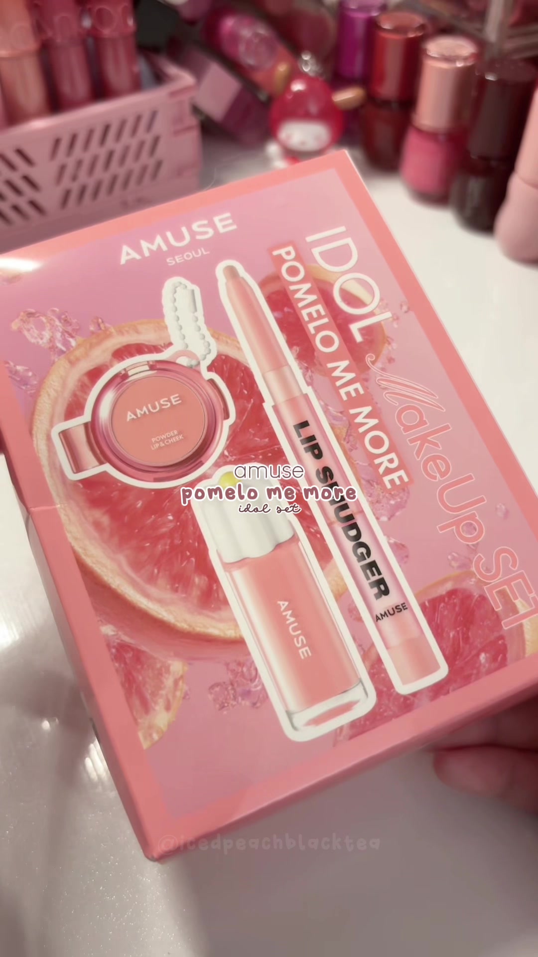 TikTok post by @icedpeachblacktea for AMUSE Seoul. Caption reads: create an kpop idol makeup look with @AMUSE Seoul!....