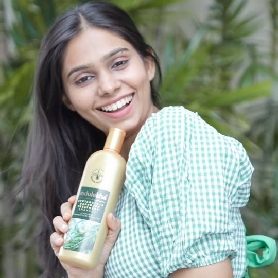 Instagram post by @dnamatched for Indulekha. Caption reads: #AD
Dandruff used to be my constant plus-one…....