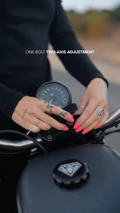 Instagram post by @tomboy_a_bit for QUAD LOCK. Caption reads: It only gets better! #quadlock #harleydavidson....