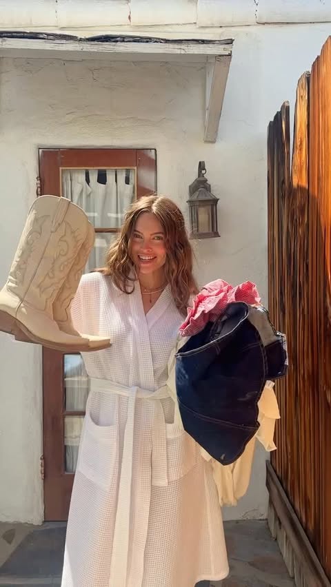 Instagram post by @heyitslanilynn for REVOLVE. Caption reads: [...] pick out an outfit for Stagecoach! 🤠....