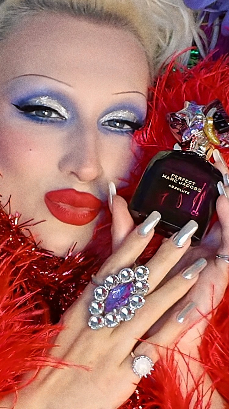 Instagram post by @junobirch for Marc Jacobs Fragrances. Caption reads: #AD Spark joy with Perfect Absolute by Marc....