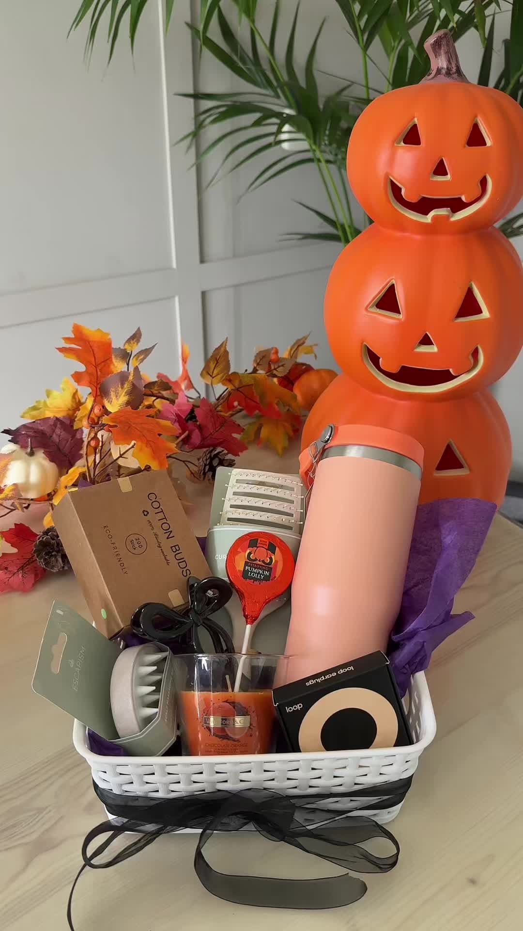 TikTok post by @sarahnicshome for Loop Earplugs. Caption reads: Boo basket surprise with @LoopEarplugs Adjust the....