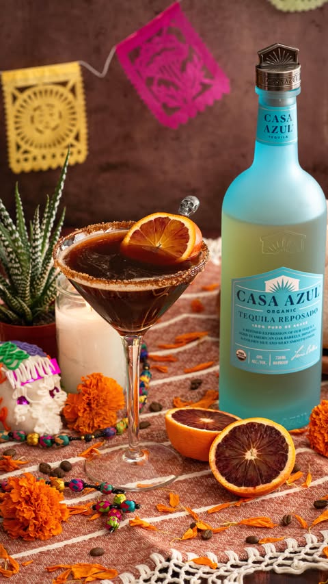 Instagram post by @nibblesnfeasts for Casa Azul Spirits. Caption reads: As we enter the month of Día de los Muertos, this....