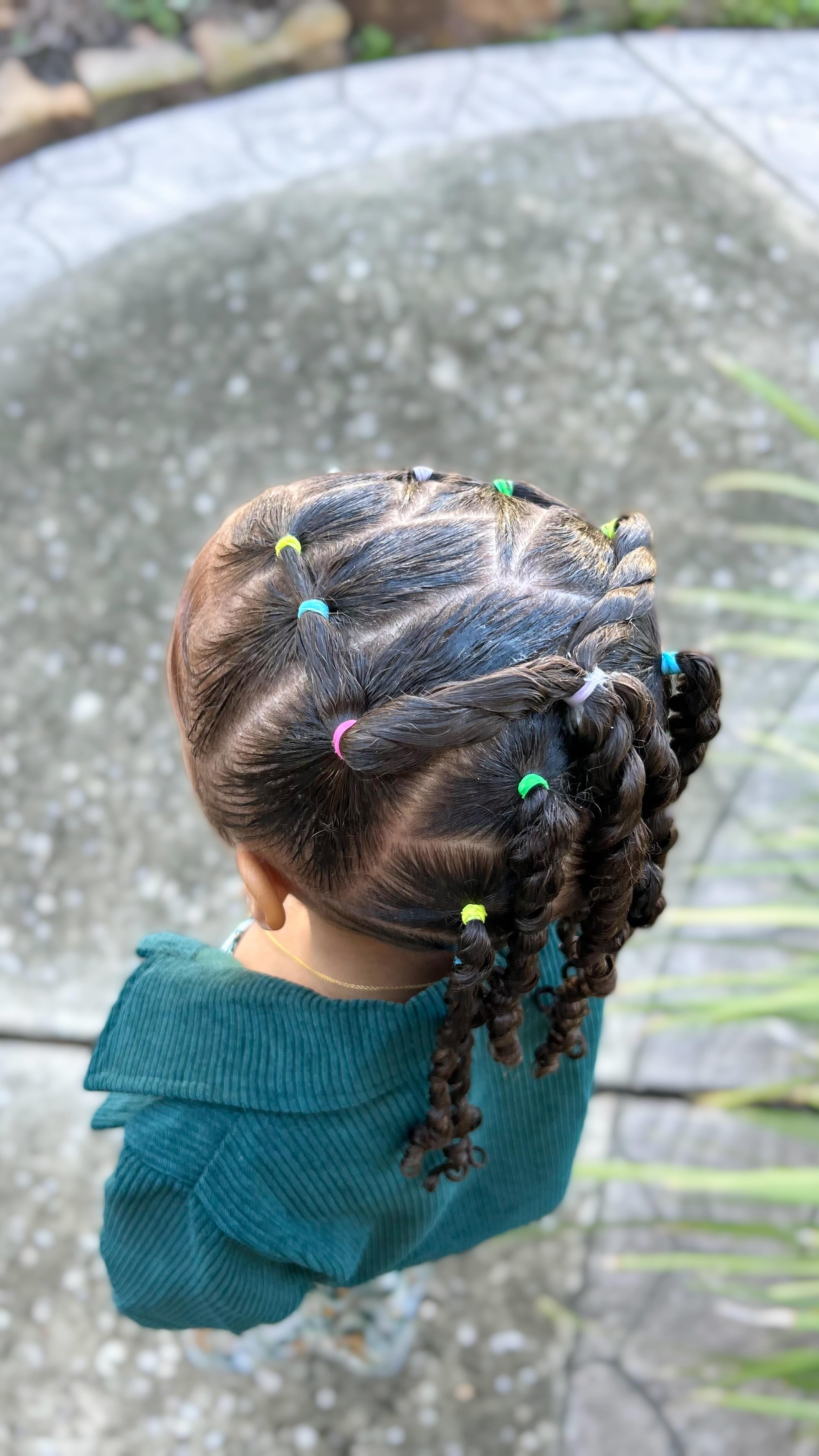 Instagram post by @ryanchloee for Camille Rose. Caption reads: Rubber band hairstyle for girls using....