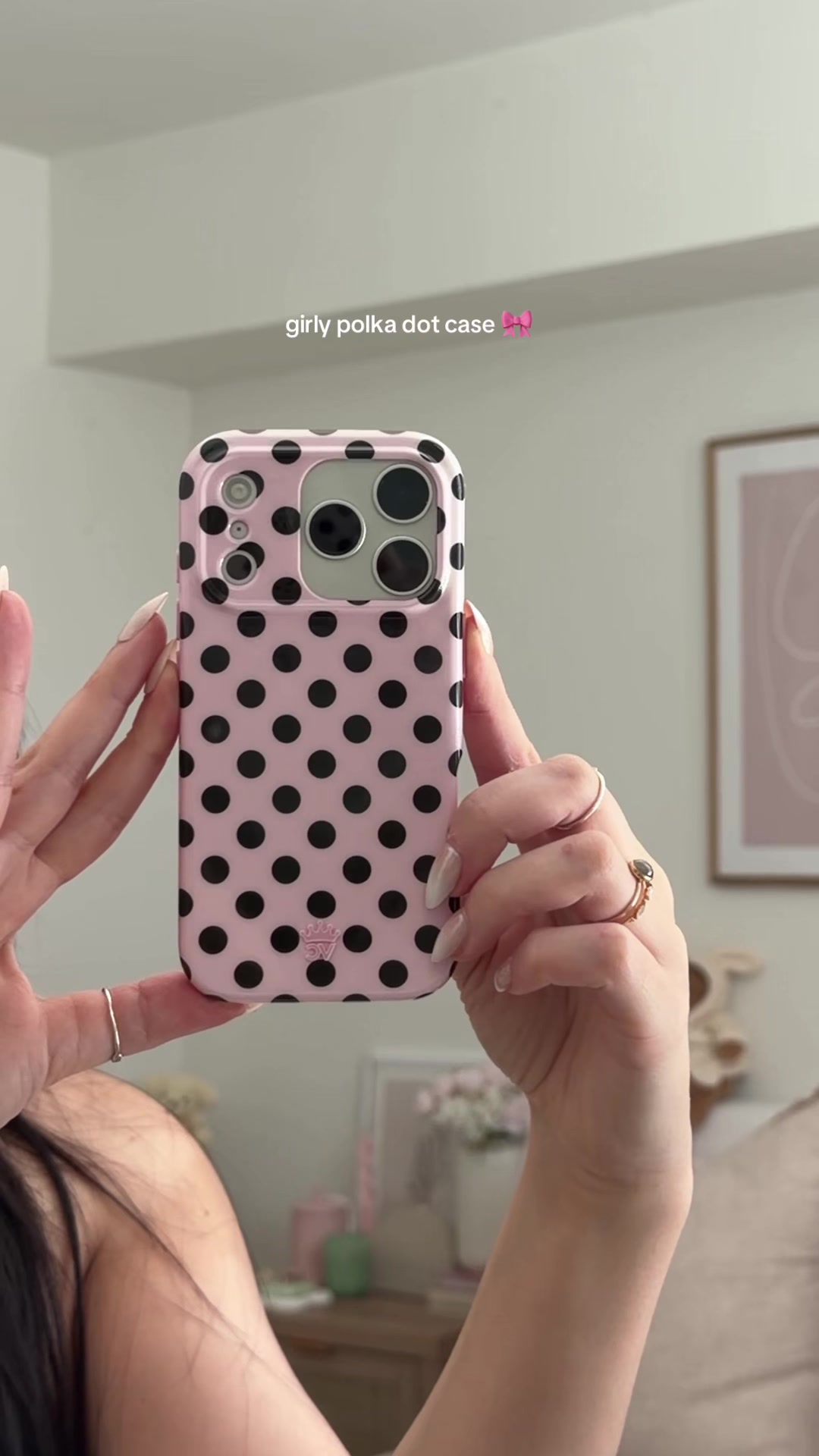 TikTok post by @kimberly.cat for VELVET CAVIAR. Caption reads: cutest girly polka dot phone case 🎀 @velvetcaviar....