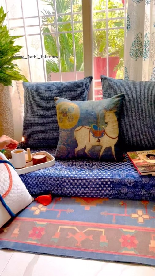 Instagram post by @veena_rathi_interiors for Pepperfry.com. Caption reads: Styled a corner in my bedroom as an ode to Indian....