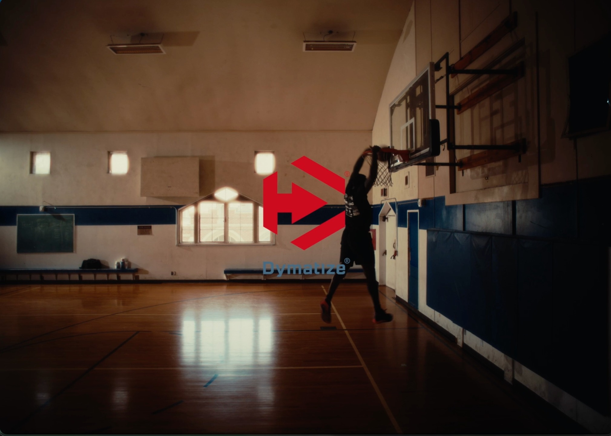 Instagram post by @juliusrandle30 for Dymatize. Caption reads: To be built different, you have to build....