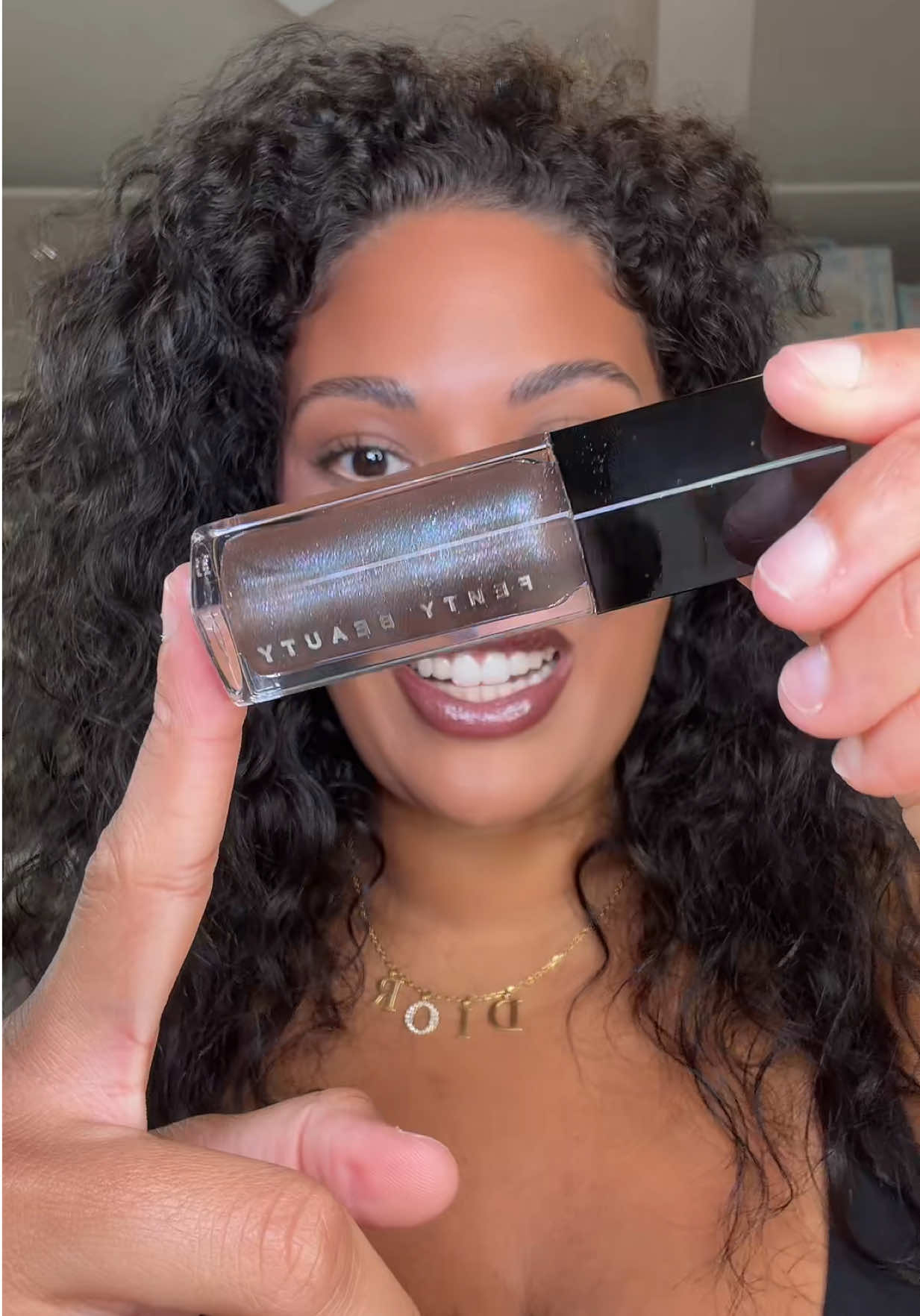 TikTok post by @brooklynreviewsxoxo for Fenty Beauty. Caption reads: caviar crystals 🖤 @Fenty Beauty #fentybeauty....