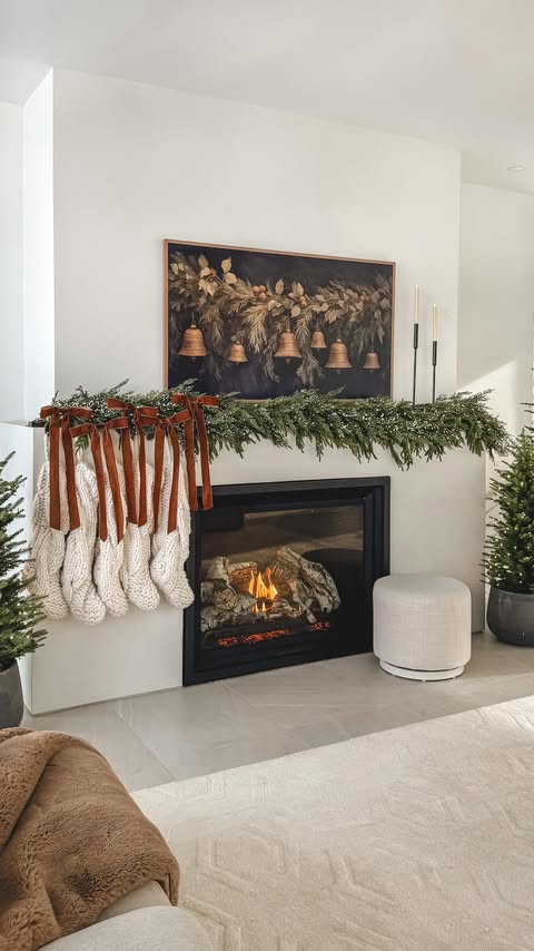 Instagram post by @_ericashaw for Pottery Barn. Caption reads: Holiday mantel magic ✨🎄 I wanted it to feel cozy....