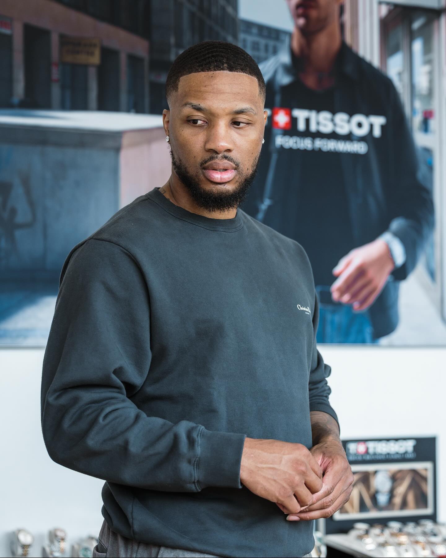 Instagram post by @damianlillard for TISSOT. Caption reads: From the quiet focus in the workshop to the energy....