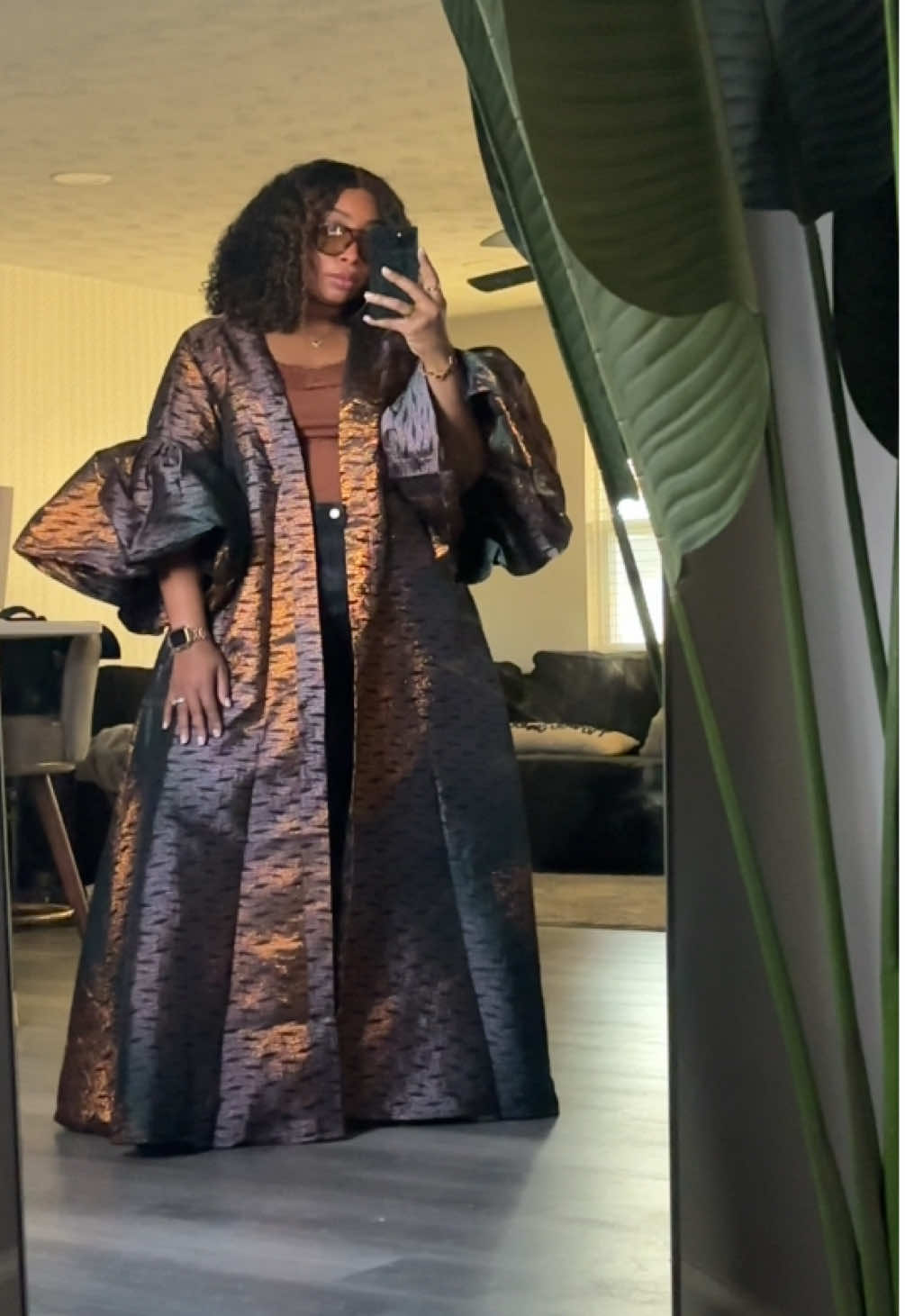 TikTok post by @carcydeneen for ShopAKIRA. Caption reads: Church OOTD. @AKIRA did their big one with this!!....