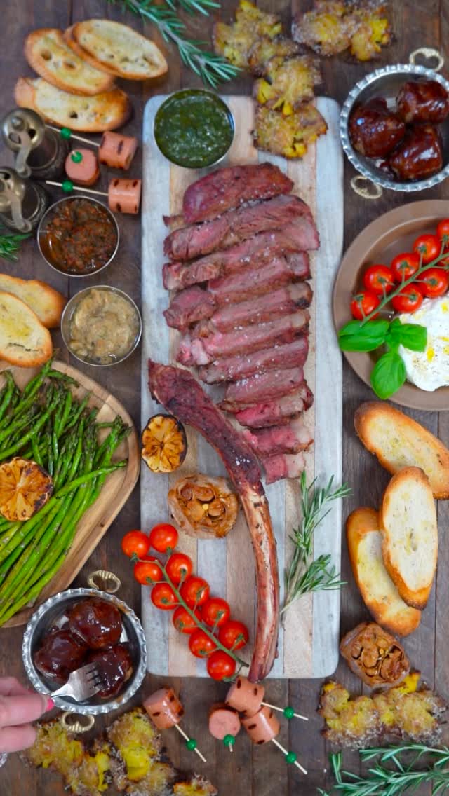 Instagram post by @coupleinthekitchen for Omaha Steaks. Caption reads: Want to win game day? 🏈 This elevated steak board....