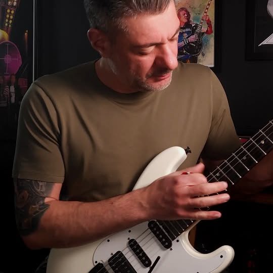 Instagram post by @licksofthebeast for SIT Strings. Caption reads: Caught Somewhere In Time - Adrian's guitar....