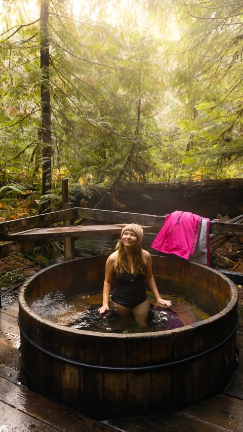 Instagram post by @voyageswithval for dryrobe. Caption reads: Send this to the person you want to hike to a hot....