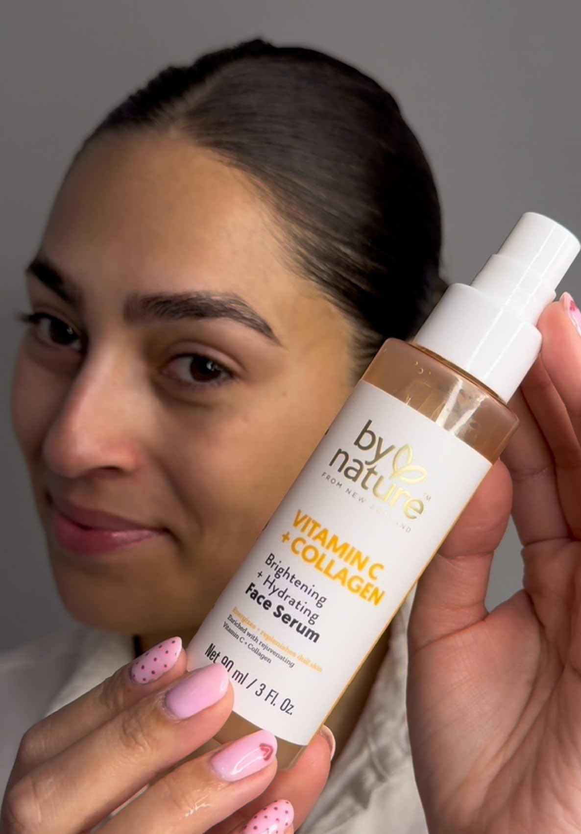 TikTok post by @gabriellyfgomes for bynatureskincare. Caption reads: [...] and I loved it! 🍊✨🪞🧡 GIFTED....