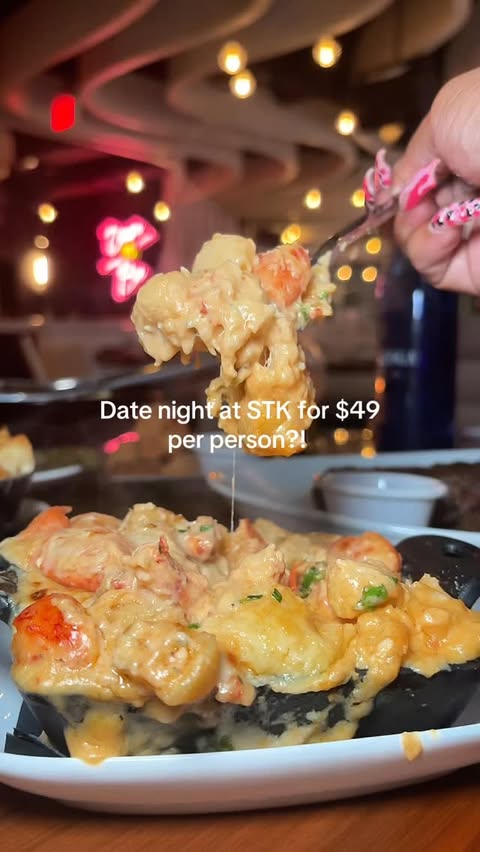 Instagram post by @xxcnicolexx for STK Steakhouse. Caption reads: If you’re looking for a date night spot in....