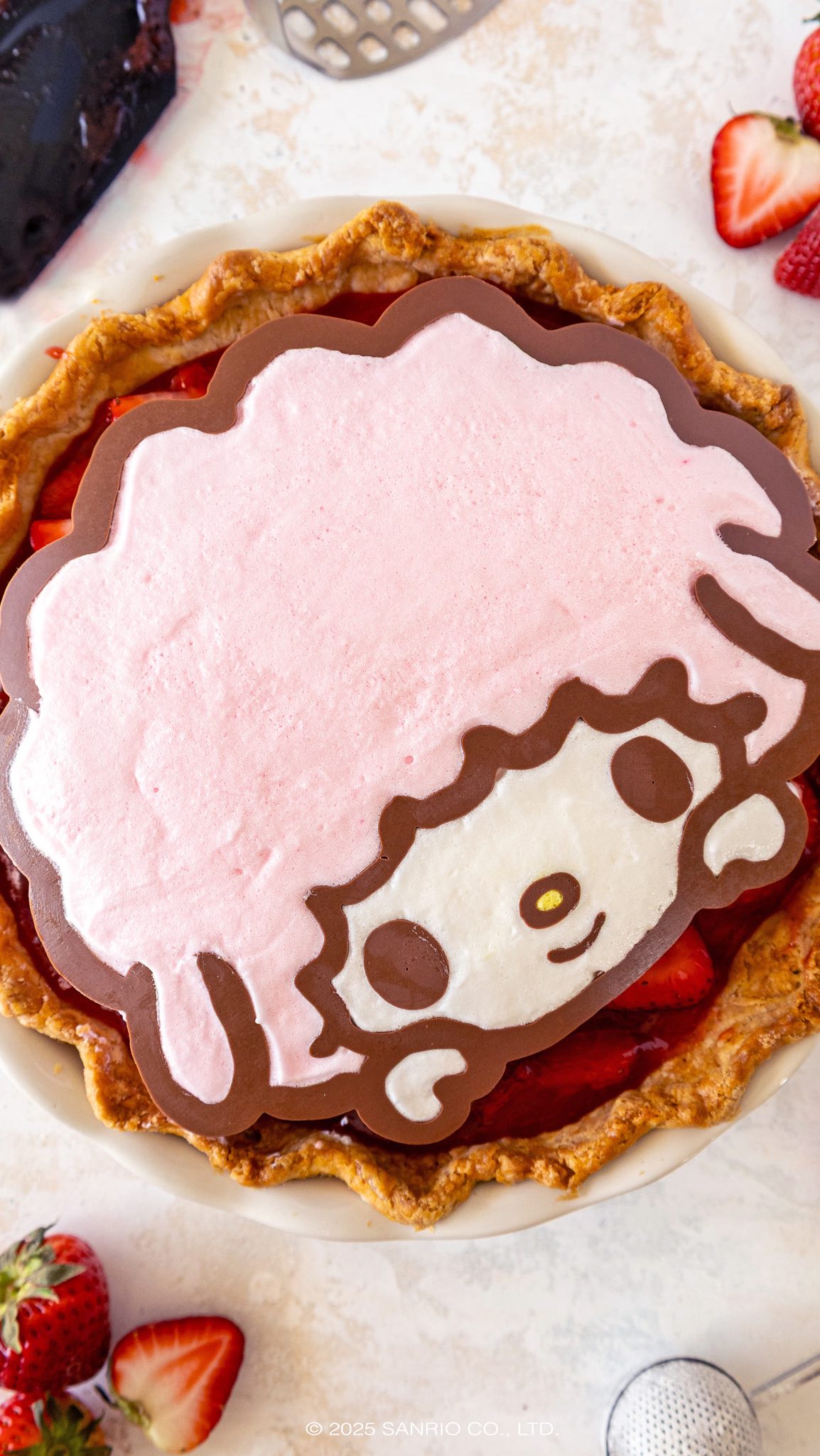 Instagram post by @chelsweets for Sanrio. Caption reads: This strawberry meringue pie is inspired by our....