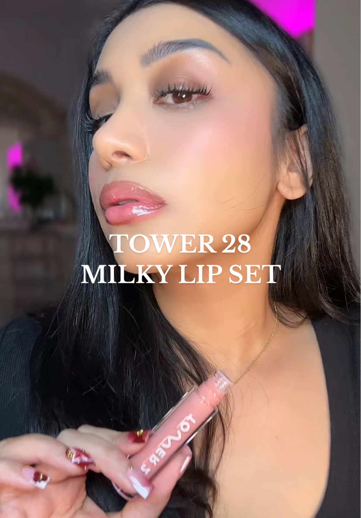 TikTok post by @annekoii for Tower 28 Beauty. Caption reads: @Tower 28 Beauty pink milky lipgloss by [...].