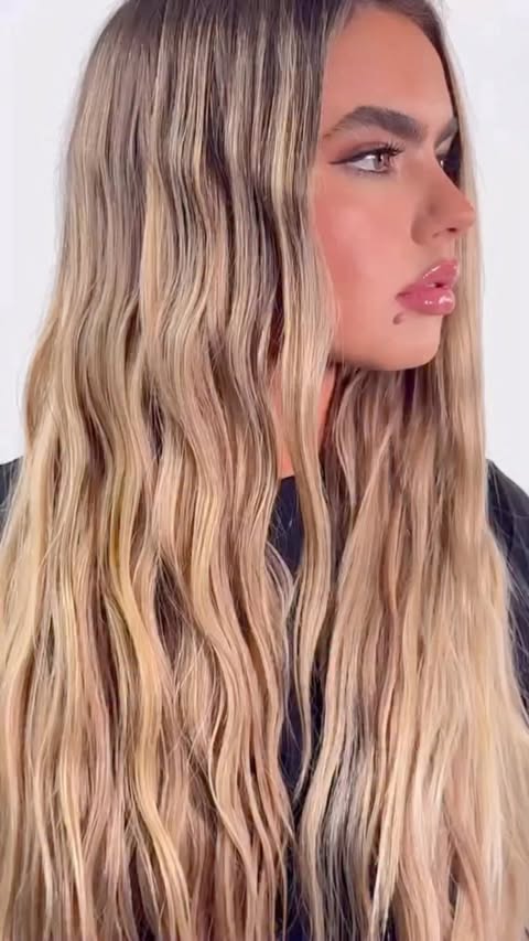 Instagram post by @lo_wheelerdavis for Donna Bella Hair. Caption reads: [...] entirely new life when we added in....