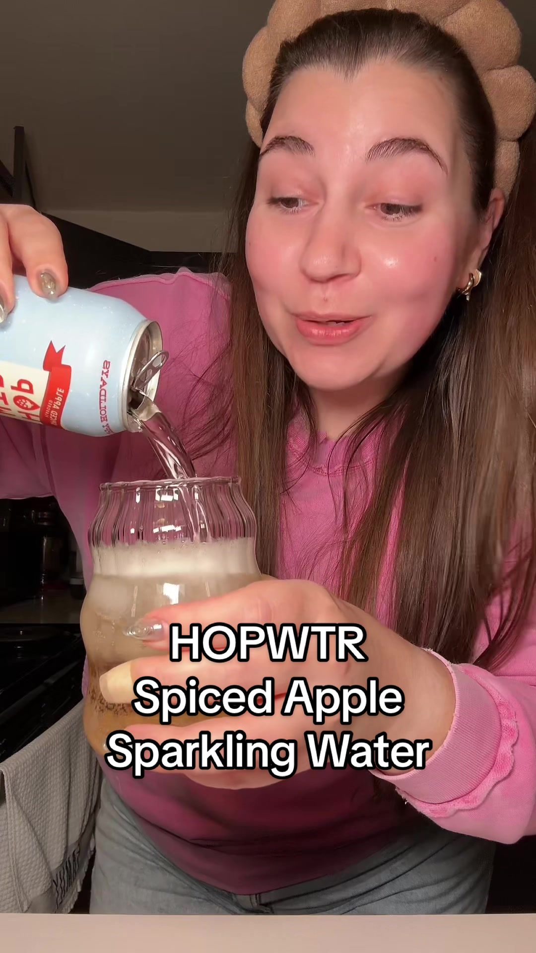 TikTok post by @oceanbrewolha for Hopwtr. Caption reads: HOPWTR Spiced Apple sparkling water 🍎💦 @HOP....