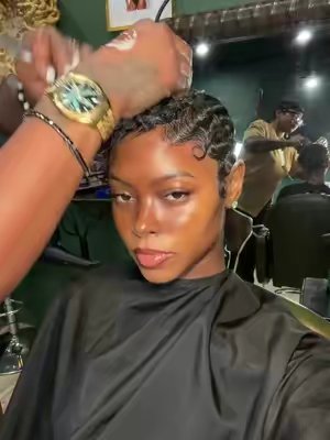 TikTok post by @bigbossvette for Kaleidoscope Hair Products. Caption reads: [...] I really got finger waves 🤭😍....