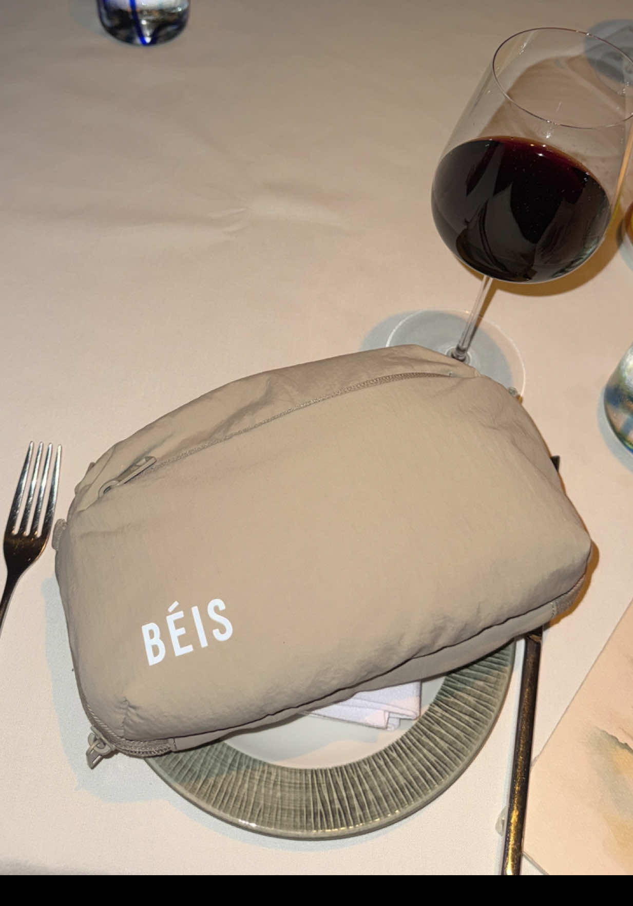 TikTok post by @melissa.spiffy for BÉIS Travel. Caption reads: Favorite @BÉIS bag ever! I bought this with my own....