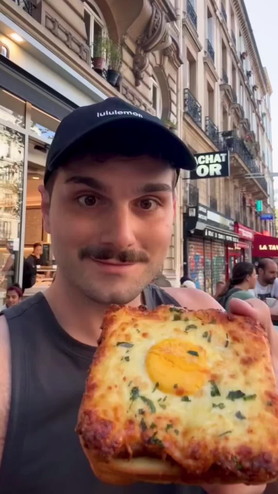 TikTok post by @michael.rizzi for Get Cracking. Caption reads: #AD | From Paris to Toronto, my love for....