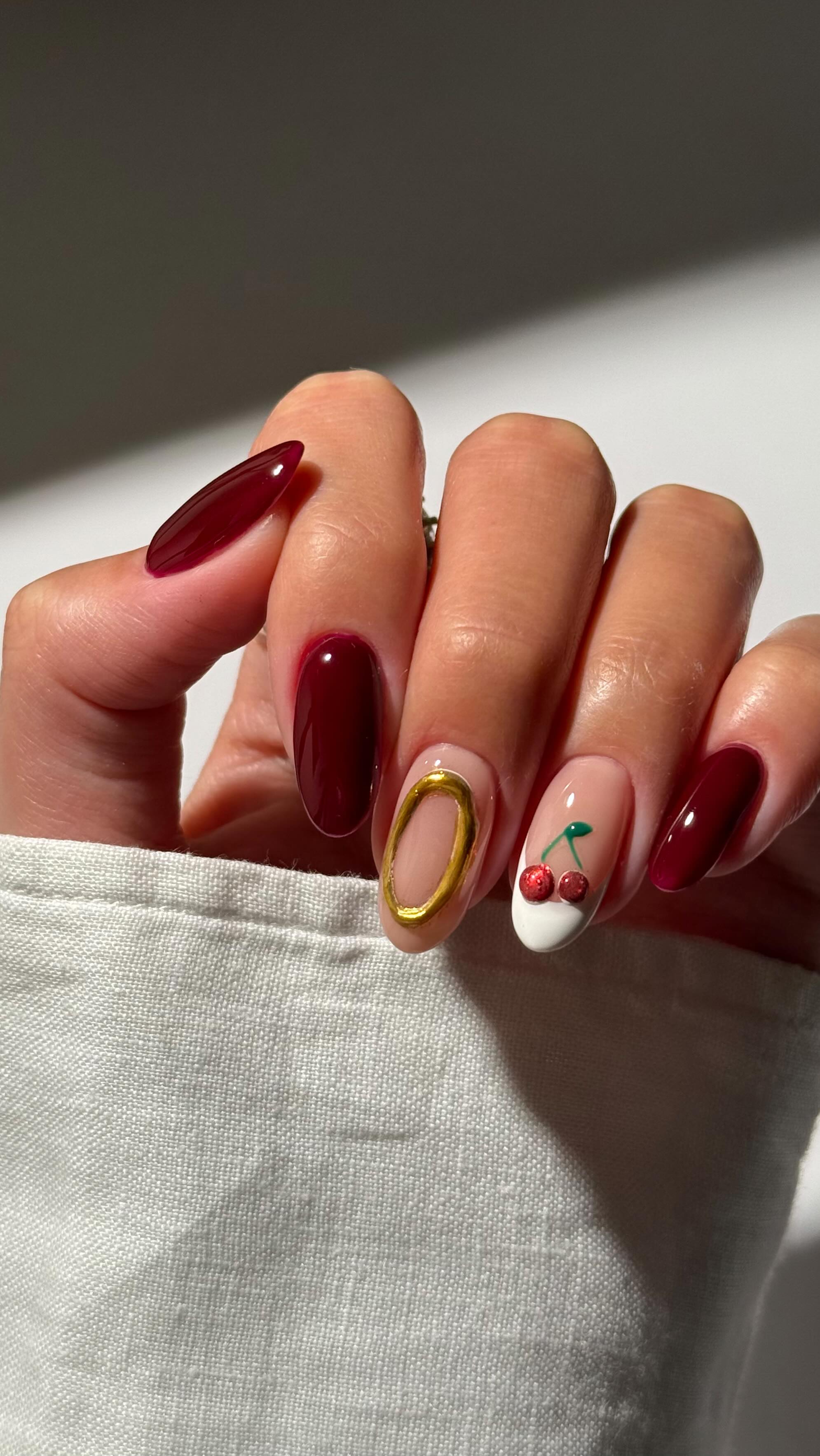 Instagram post by @vviki.mani for Semilac. Caption reads: 3D cherry nails 🍒✨🤍
Yes or no? 🥹

@semilac
939....