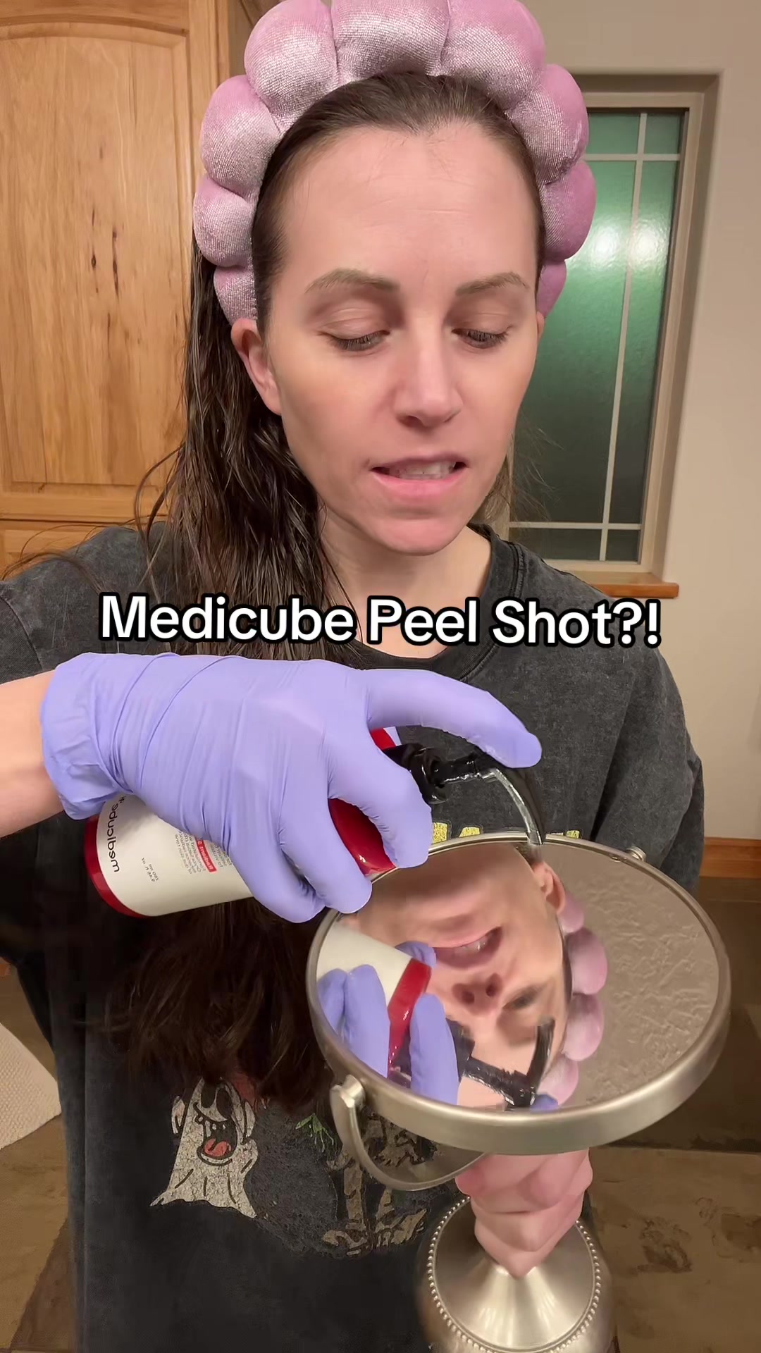TikTok post by @itskristincamacho for Medicube. Caption reads: Medicube face + body Peel Shot duo [...].