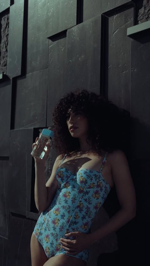 Instagram post by @minaelhammani for Dolce&Gabbana Beauty. Caption reads: Publi/ Living in an eternal summer with Light Blue....