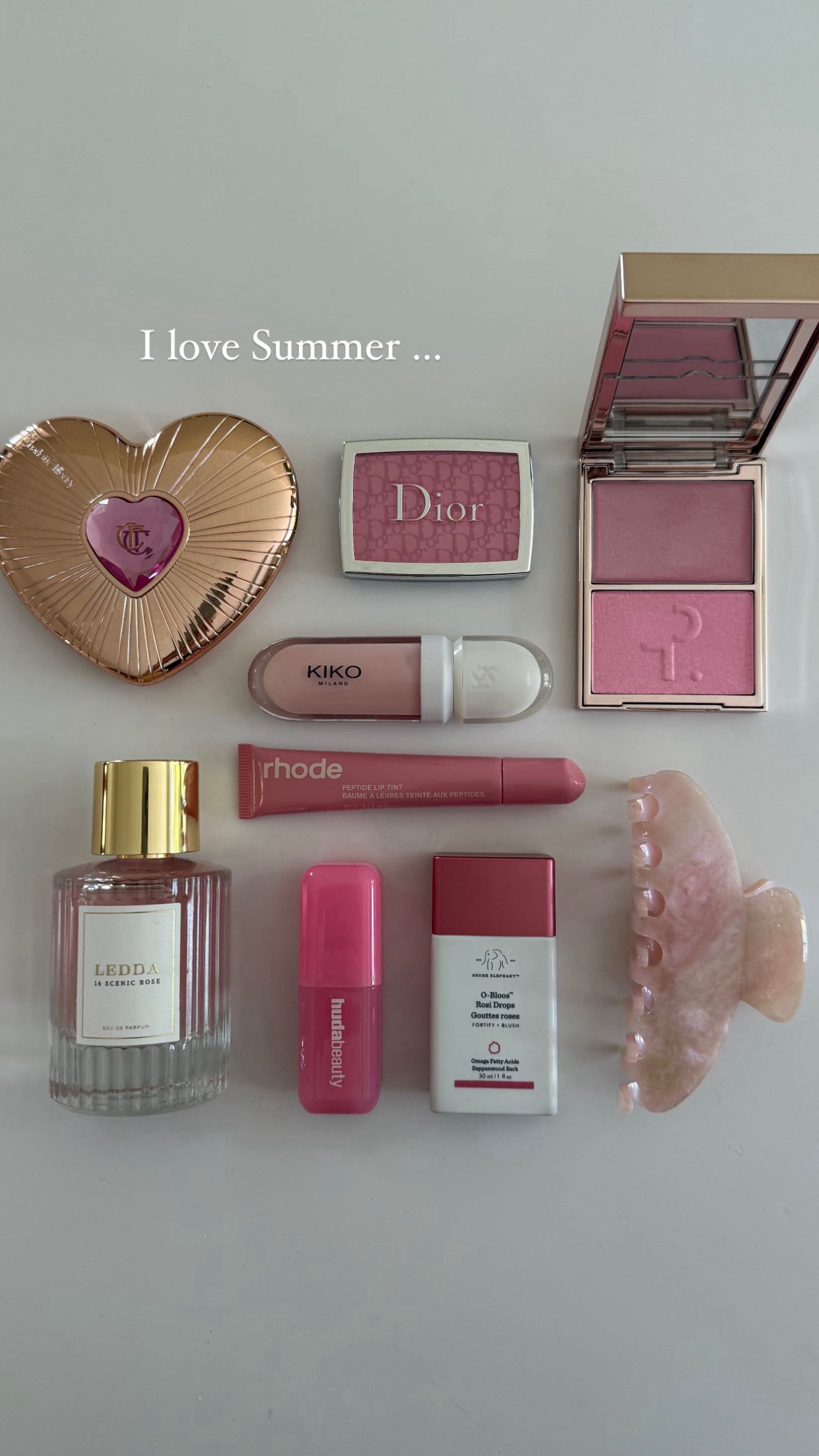 Instagram post by @carrieanne_ for Rhode Skin. Caption reads: I love both 🎀🤎

@charlottetilbury @diorbeauty*....