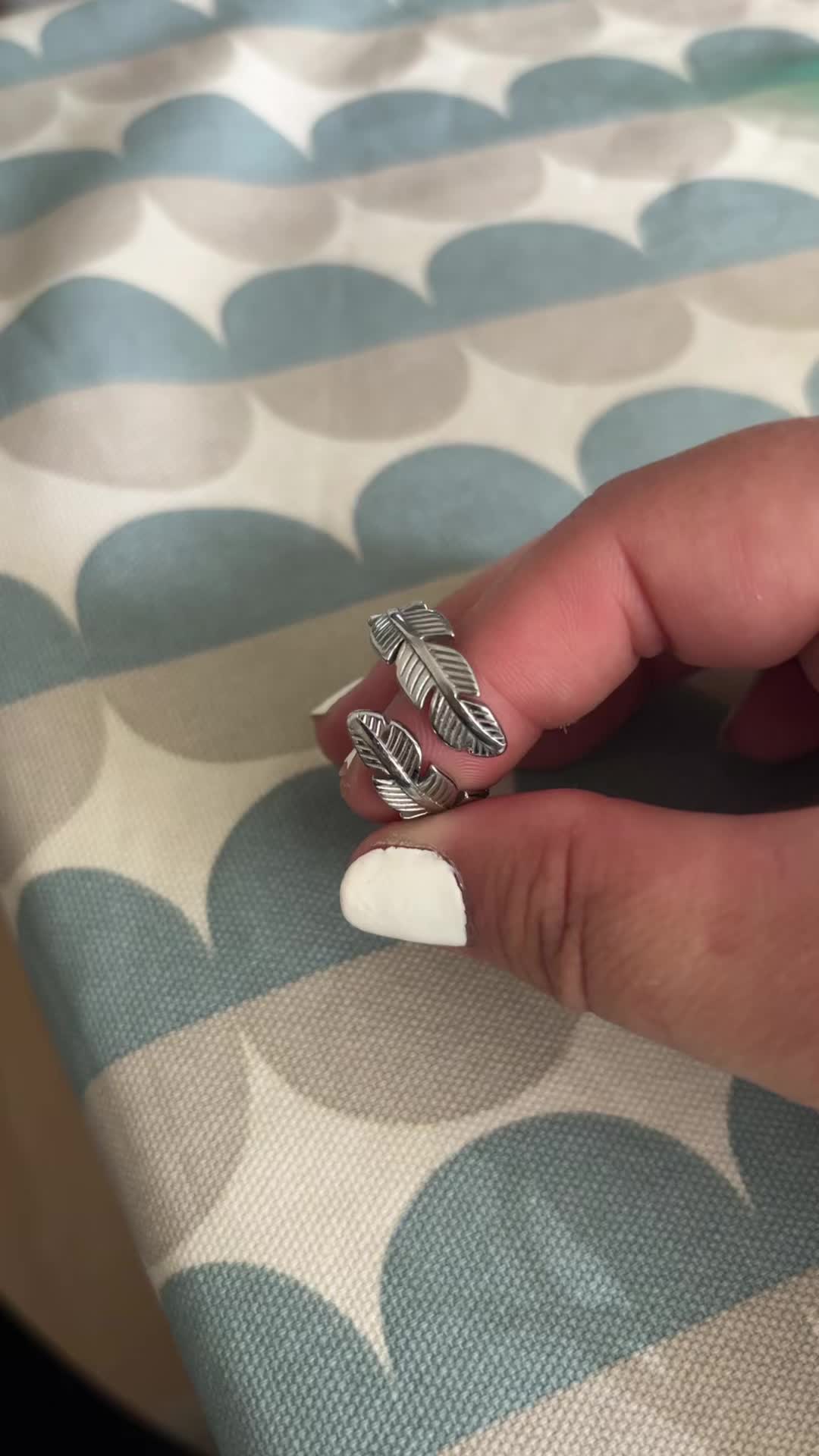 TikTok post by @clean2keepsane for Soul Analyse. Caption reads: Adore this feather ring from @Soul Analyse It’s....